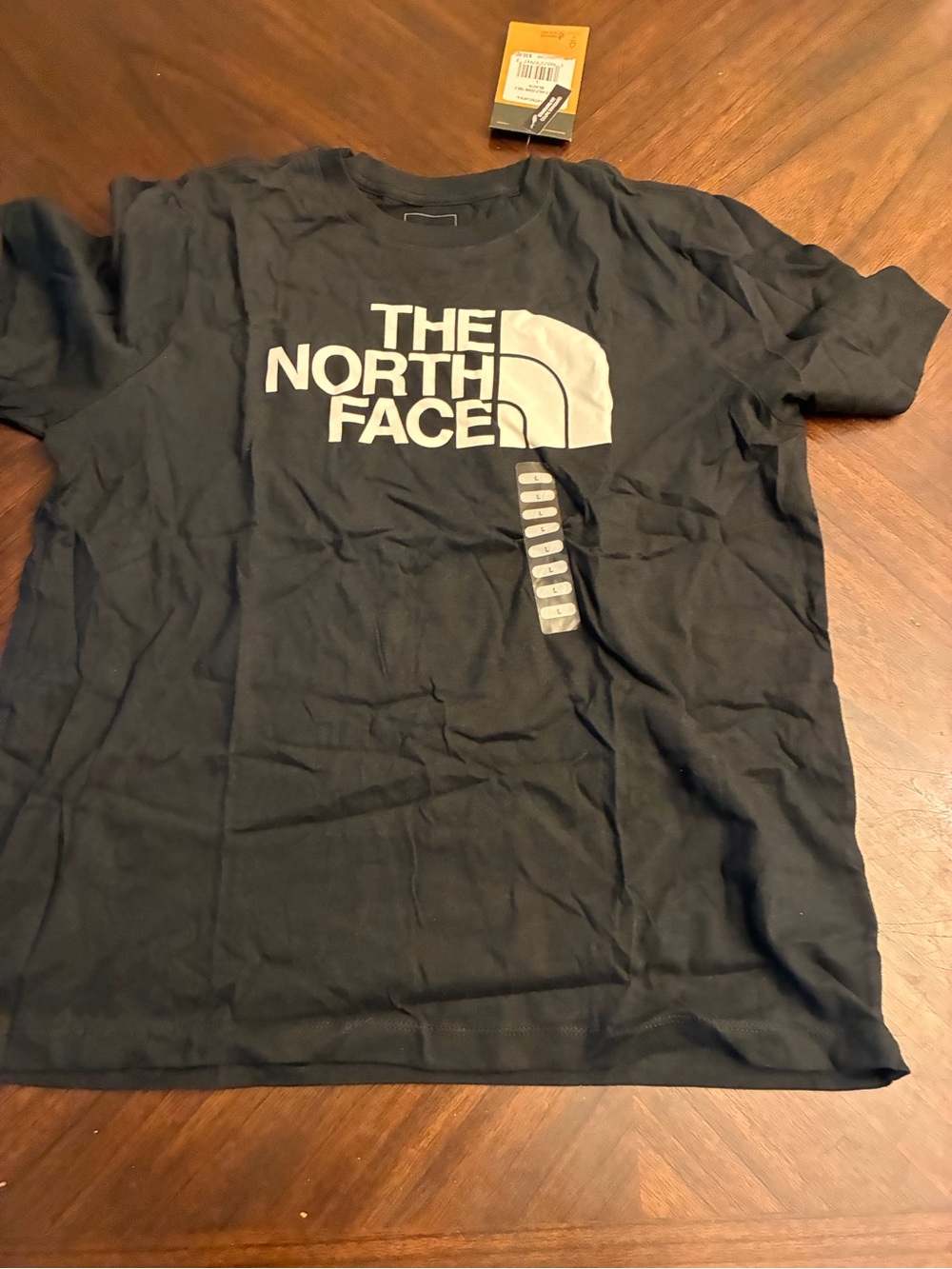 New Women’s s/s half done tee 2 Black size large